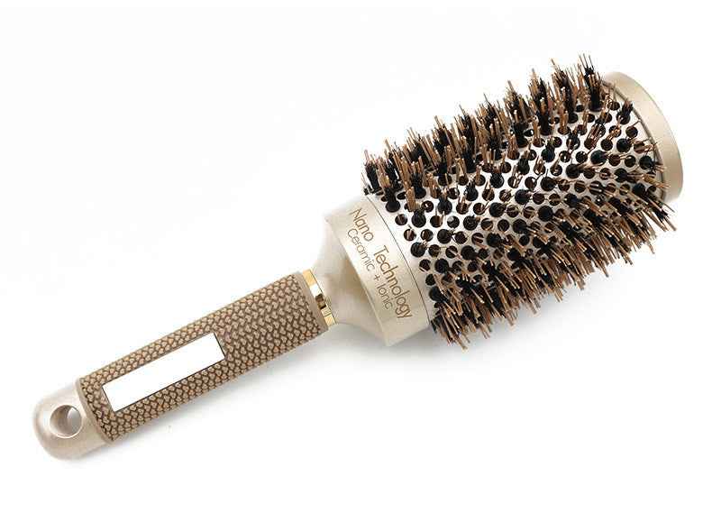 Cepillo térmico de cerámica con tecnología nano para peinado profesional.