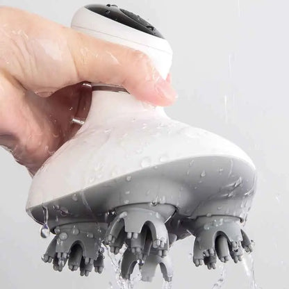 Masajeador capilar eléctrico de silicona con cabezales rotatorios para cuero cabelludo.