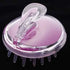 Masajeador de cuero cabelludo ergonómico de color rosa y transparente para relajación.